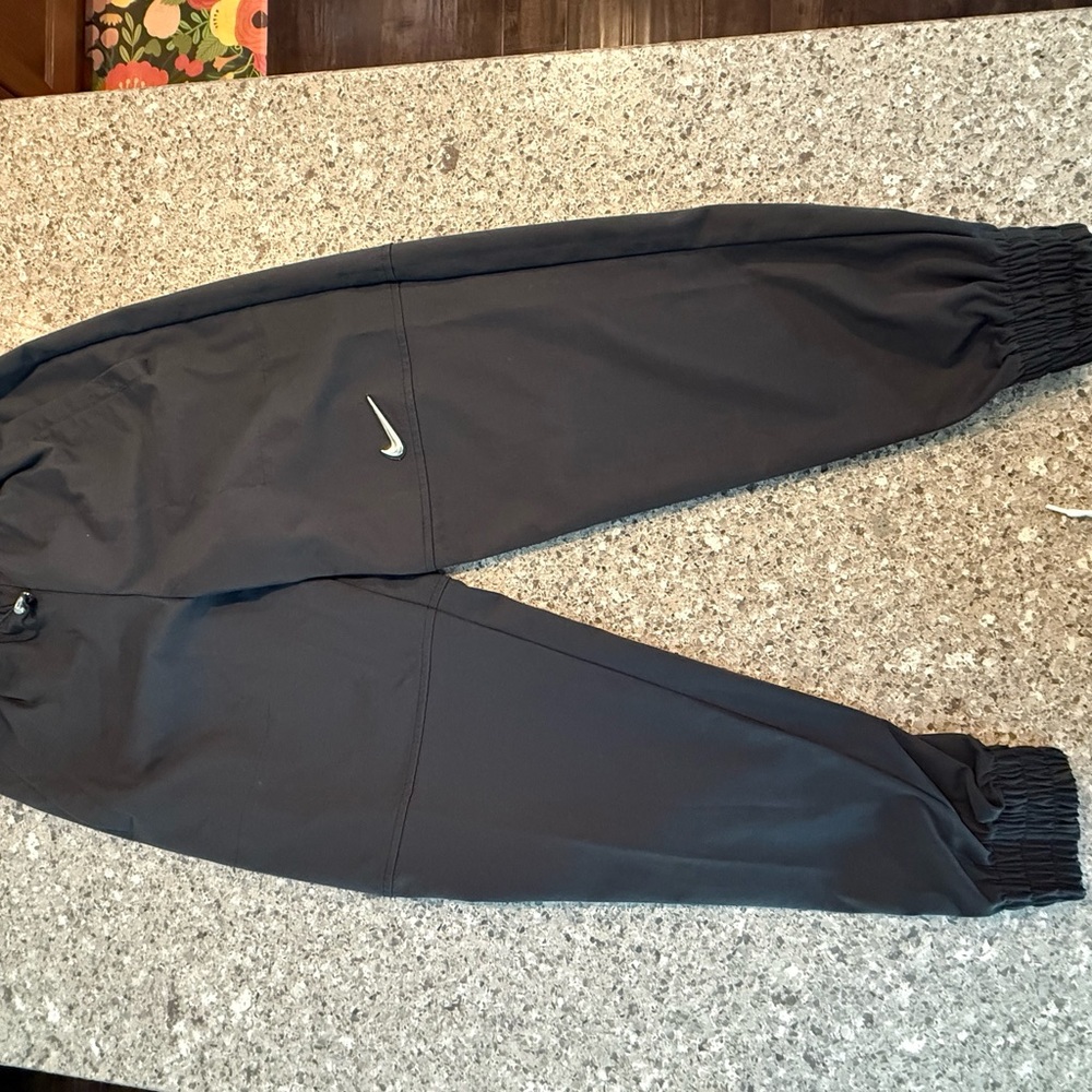 Nike Black Sweatpants with Elastic Cuffs and Tapered Fit